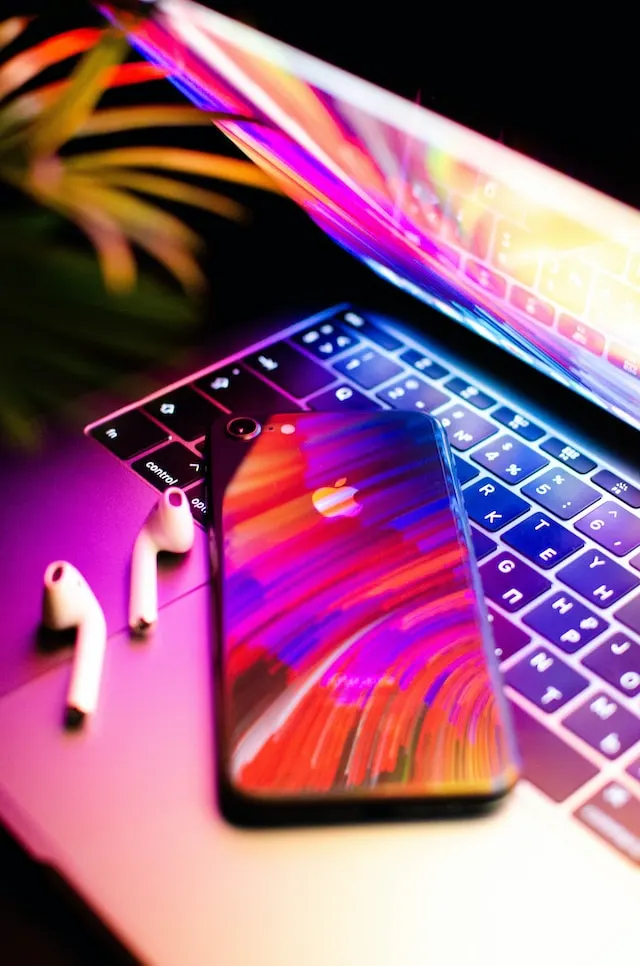 Laptop, mobile phone & headphones